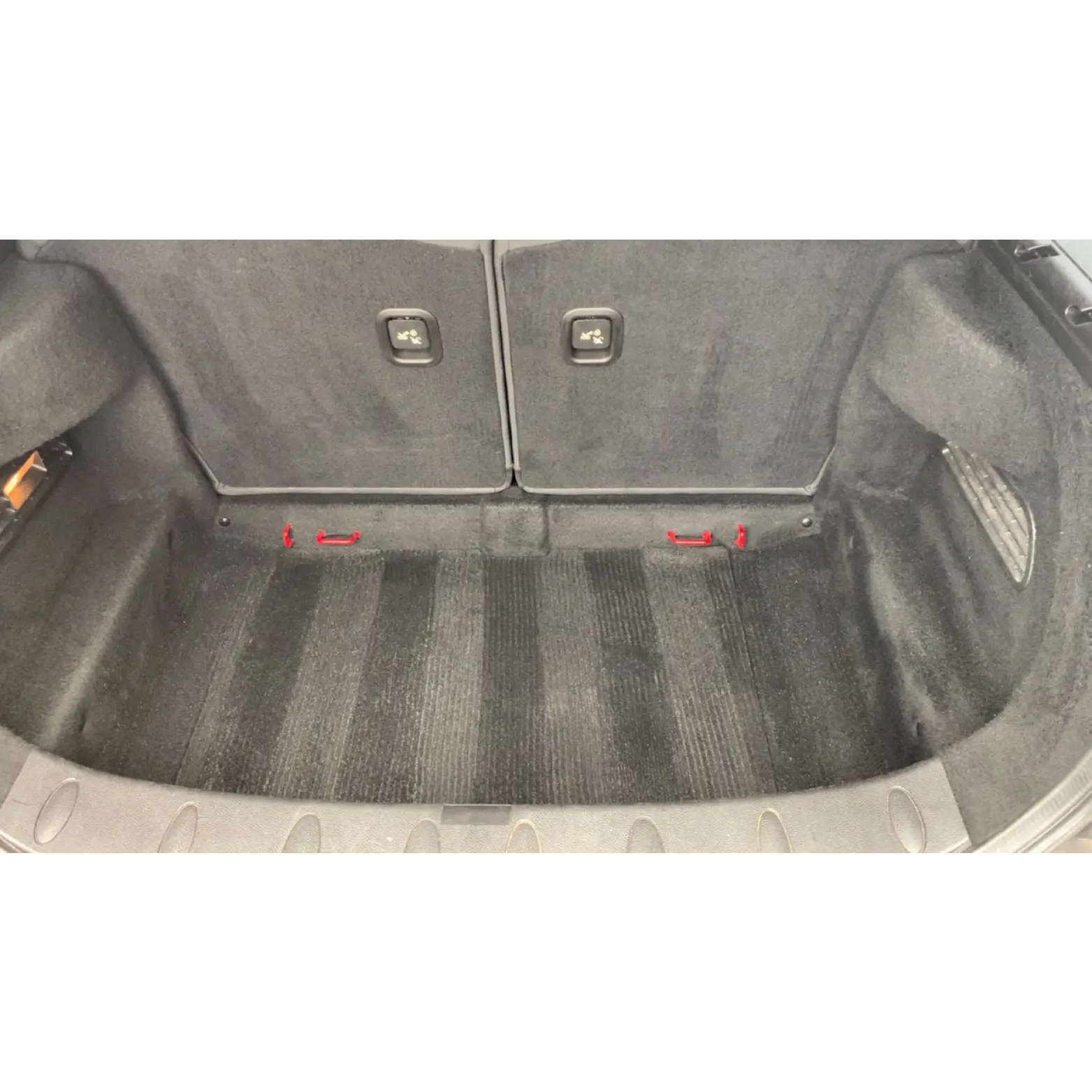 Before and after car valet showing restored paintwork and detailed interior cleaning